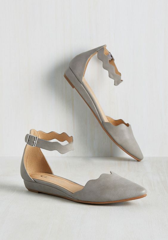 flaunt faux-leather uppers, wavy straps, and silver buckles