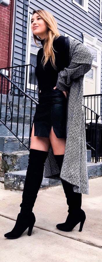 black mini dress with thigh high boots