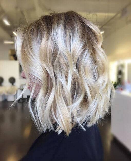 Platinum Lob with Subtle Curls.